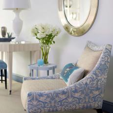 Patterned Armchair and Silver Mirror