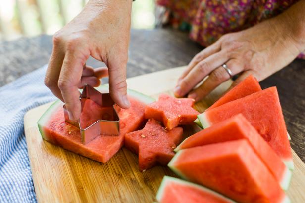 Cut large slices of watermelon, then press the cookie cutter into the slices for star shapes.