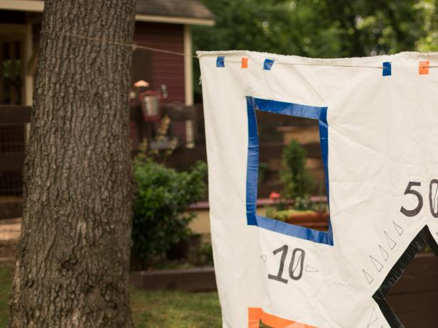 Kick your tailgate parties up a notch with this fun Drop Cloth Toss Game you can make in less than an hour.
