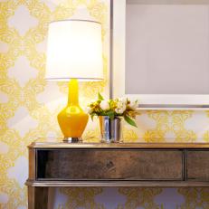 Sunny Yellow Foyer With Antique Finished Console