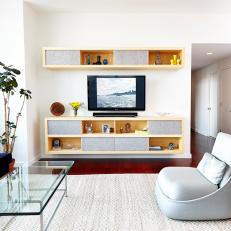 Bright Living Room With Floating Entertainment Center
