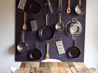 Pots and Pans Displayed on Pegboard