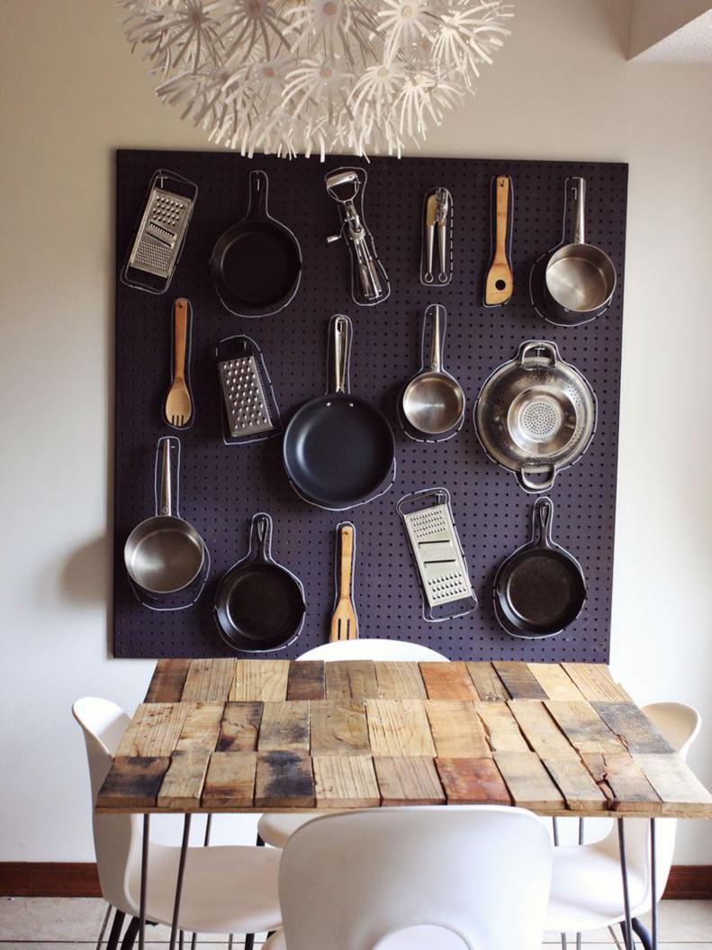 Pots and Pans Displayed on Pegboard