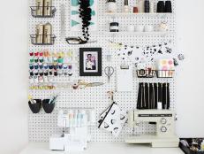 Floor-to-Ceiling Pegboard Storage in Craft Room