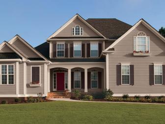 Neutral Traditional Home Exterior With Red Front Door