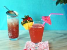Combining the tropical flavors of coconut and pineapple with a pretty pink hue, this oh-so-sippable cocktail is sure to get you into a sunny state of mind -- any time of the year.