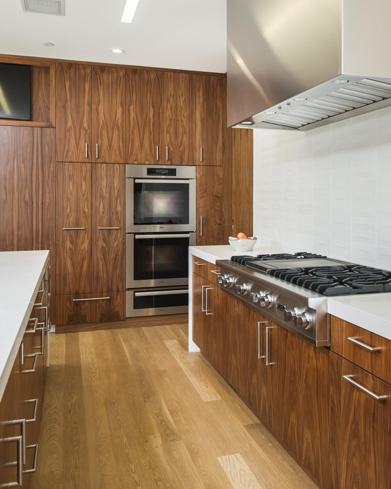 Modern Kitchen With Zebra Wood Cabinetry And White Countertops Hgtv