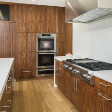 Modern Kitchen with Zebra Wood Cabinetry and White Countertops