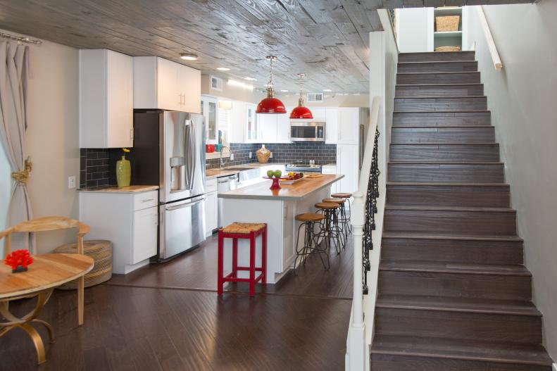 Lucy and Daphne transformed this kitchen space into a modern red-and-gray masterpiece with rustic and industrial design elements. See our favorite details from the space, and see all the before-and-after photos. 