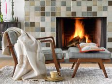 Wood Chair in Front of Tiled Fireplace