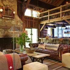Cozy Rustic Living Area With Stone Fireplace