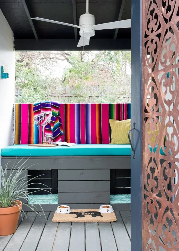 Porch With Colorful Built-In Bench & Dog Beds Underneath