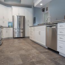 Transitional Style Kitchen With Stainless Steel Appliances and Tile Floor