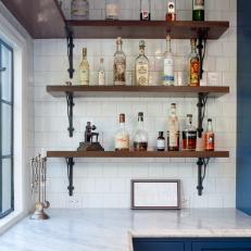 Kitchen with Wood and Iron Shelves Plus Tile Walls and Marble Counters