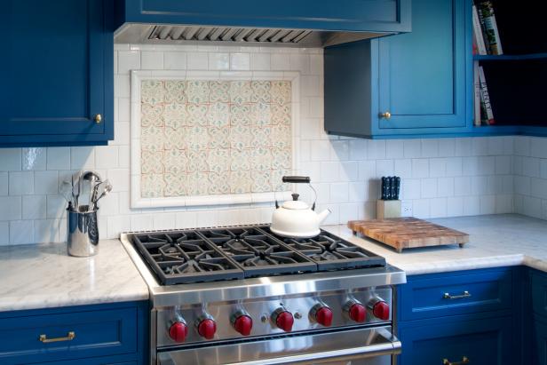 Contemporary Kitchen with White Tile Backsplash and Blue Cabinets | HGTV