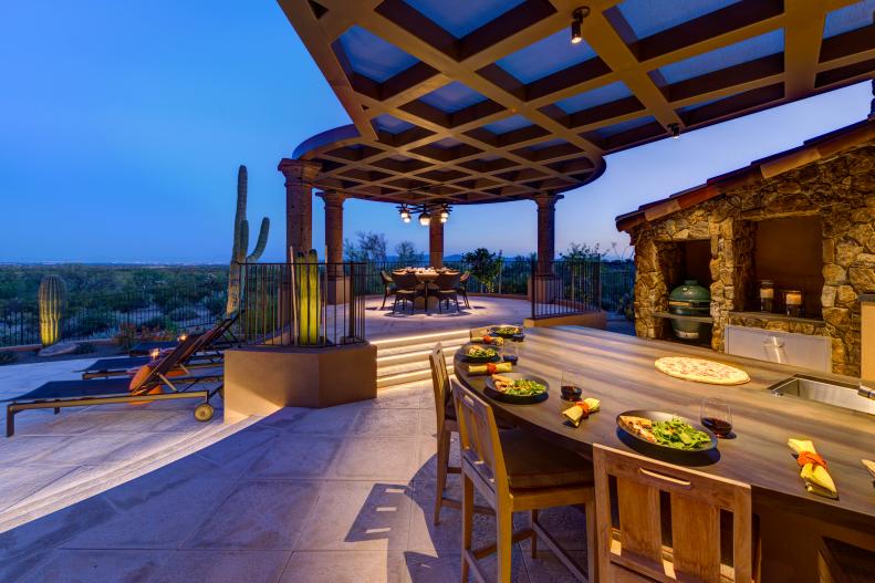 Contemporary Outdoor Kitchen With Bar Seating & Custom Pergola