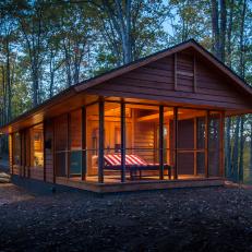 Screened Cabin Porch Creates Indoor-Outdoor Feel