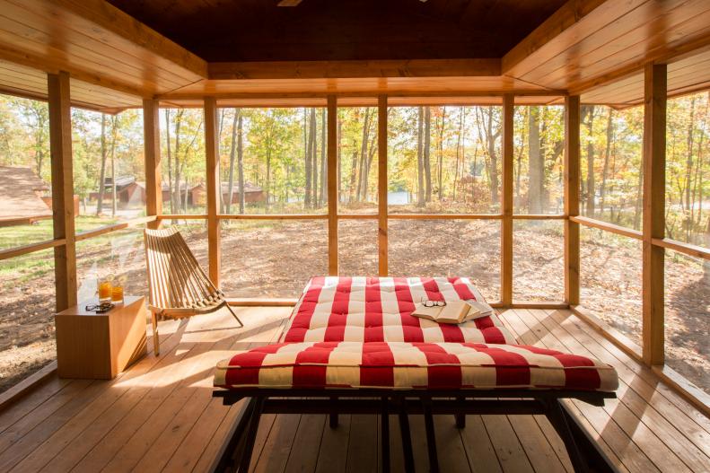 Red and White Striped Daybed in Screened Porch