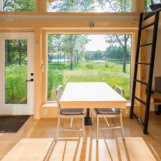 Tiny Home Features Oversized Windows and Wood Floors