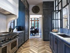 Chevron Wood Floors Take Center Stage in Galley Kitchen