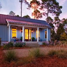 Small Farmhouse-Style Cottage Features Simple Landscaping