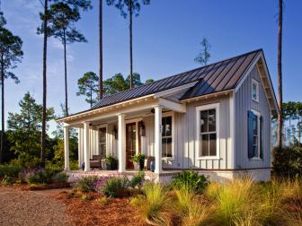 Small Home With Gray Siding and Metal Roof