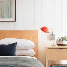 Paneled Accent Wall Adds Interest to White Bedroom