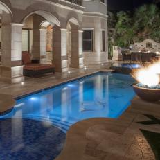 Mediterranean Patio Features Luxurious Swimming Pool & Strong, Romanesque Architecture