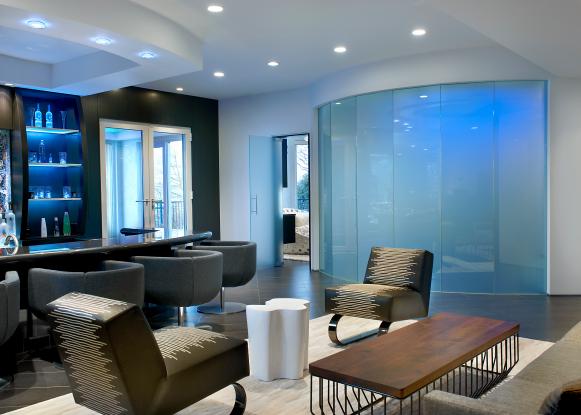 Lounge With Curved Glass Wall and Wet Bar