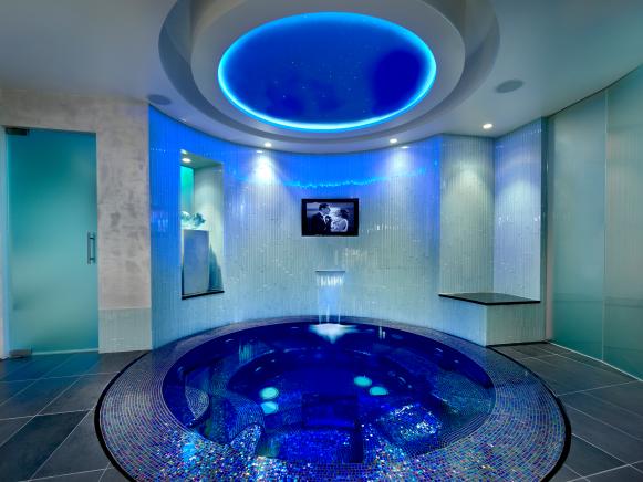Blue Tile Hot Tub With Flat-Screen TV
