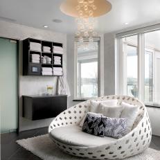 White Woven Sofa and Bubble Light Fixture