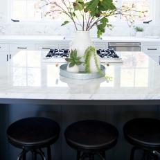 Gray Island Offers Contrast in Airy White Kitchen