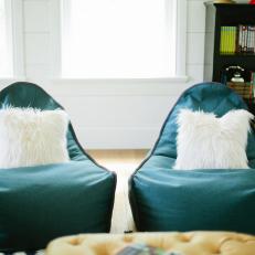 Unique Blue Chairs with White Funky Throw Pillows