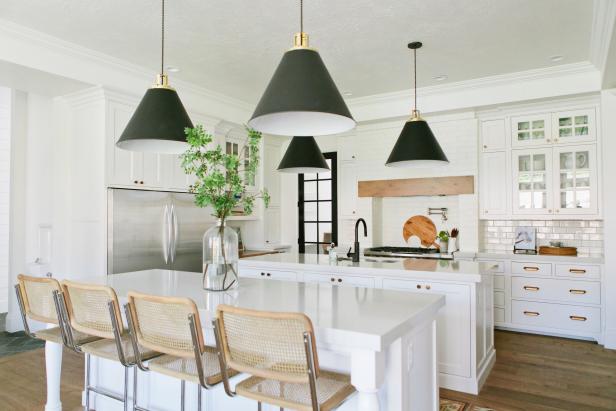 white kitchen with black pendant lights