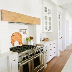 White Kitchen with Stainless Double-Oven Gas Range
