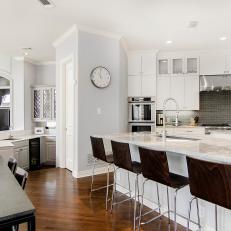 White Transitional Open Plan Kitchen With Clock