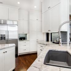 White Transitional Kitchen With Stainless Refrigerator