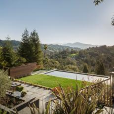 Split-Level Backyard With Pool and Hill Views