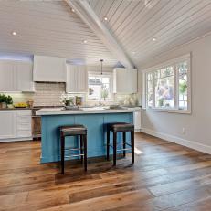 White Cottage Kitchen With Touches of Blue