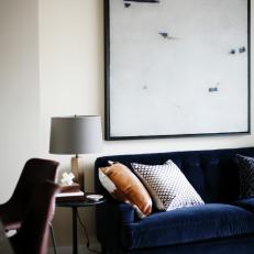 Navy Blue Velvet Sofa & Minimalist Art 