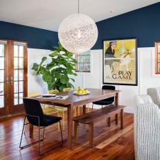 Blue and White Contemporary Dining Room With Orb Light