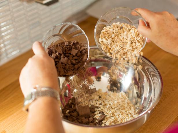 In a large bowl combine the crushed graham crackers and oats.