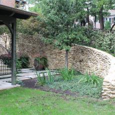 Stone Garden Wall in Traditional Backyard