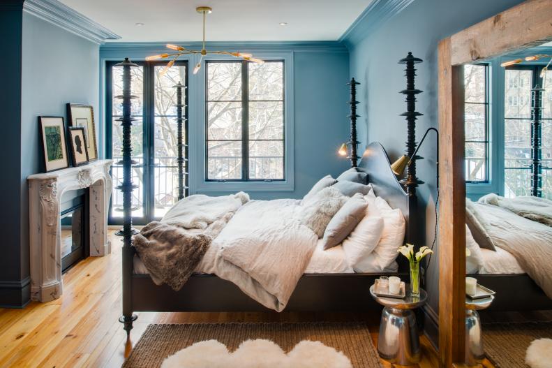 Blue Transitional Master Bedroom With Four-Poster Bed and Fireplace