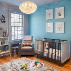 Contemporary Nursery With Baby-Blue Accent Wall