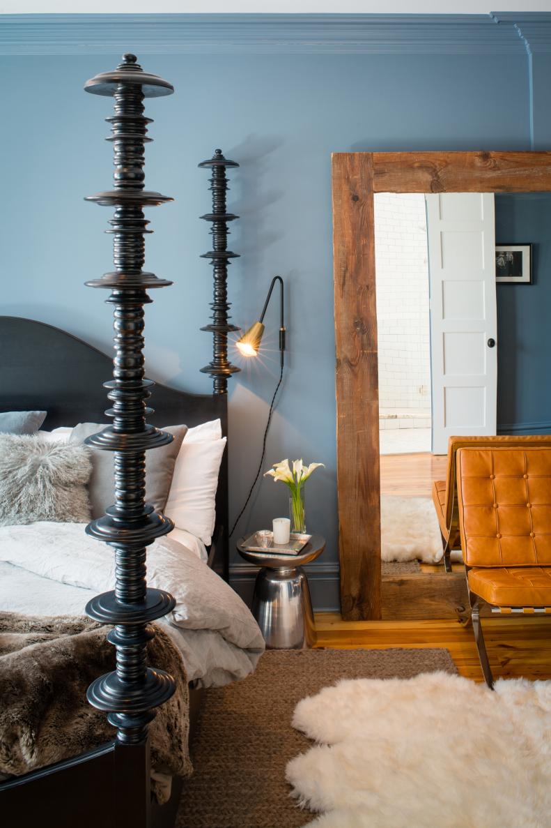 Transitional Blue Master Bedroom With Large Wood-Framed Mirror