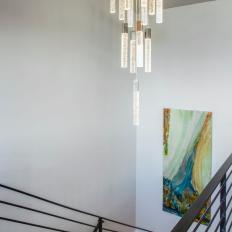 Stairwell With Light Fixture and Painting