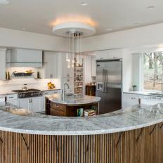 Neutral Contemporary Kitchen With Curved Bar