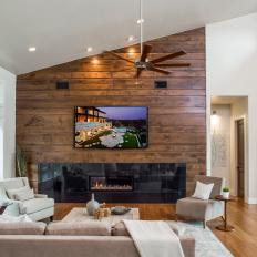 Neutral Contemporary Living Room With Wood Paneled Wall