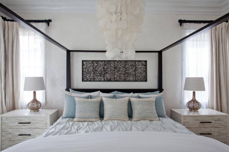 Neutral Contemporary Bedroom With Black Bed & Light Blue Accents